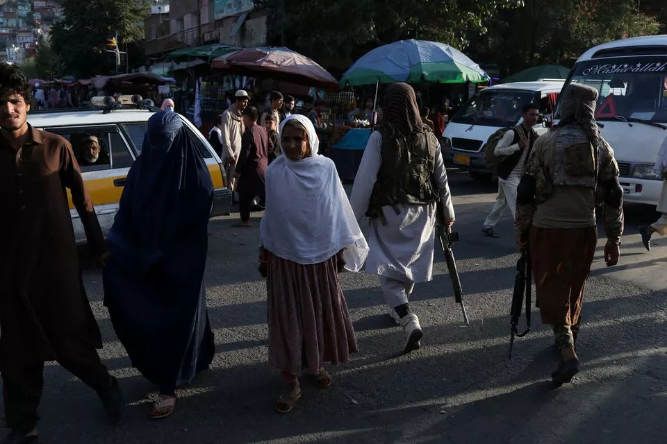 two taliban soldiers patrol the city center of kabul afghanistan september 1 2021 wana west asia news agency via reuters two taliban soldiers patrol the city center of kabul afghanistan september 1 2021 wana west asia news agency via reuters