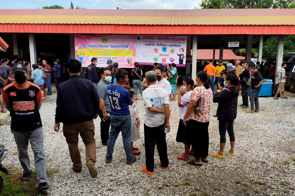 people gather outside of a daycare center s scene of a mass shooting in the town of uthai sawan sakdipat boonsom handout via reuters