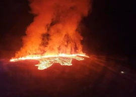 iceland volcano recedes after black day of town fires