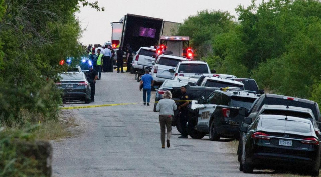 law enforcement officers work at the scene where people were found dead inside a trailer truck in san antonio texas us june 27 2022 reuters law enforcement officers work at the scene where people were found dead inside a trailer truck in san antonio texas us june 27 2022 reuters