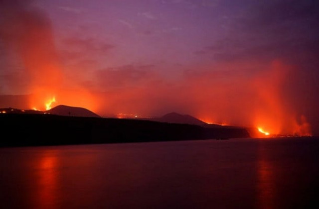 lava flows following the eruption of a volcano on the canary island of la palma as seen from tazacorte port spain october 1 2021 reuters lava flows following the eruption of a volcano on the canary island of la palma as seen from tazacorte port spain october 1 2021 reuters