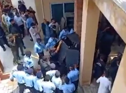 water bottle thrown at pti chief during court appearance water bottle thrown at pti chief during court appearance
