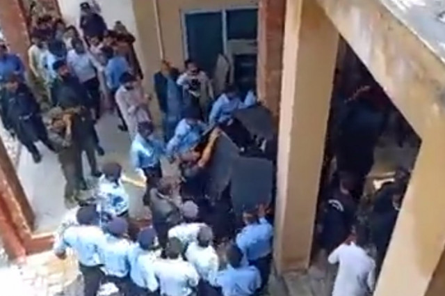 water bottle thrown at pti chief during court appearance water bottle thrown at pti chief during court appearance