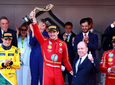leclerc battles tears to secure stirring monaco home win