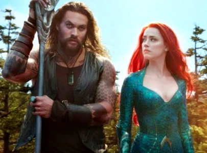 amber heard s role in aquaman cut due to lack of chemistry not ongoing trial