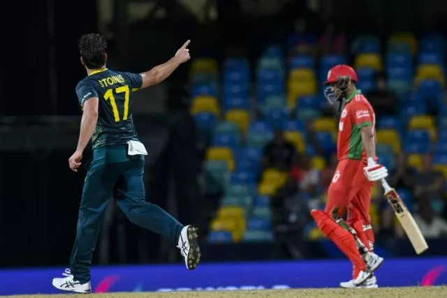 stoinis shines as australia cruise past oman in opener stoinis shines as australia cruise past oman in opener