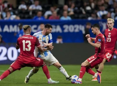 argentina begin copa title defence with 2 0 win over canada