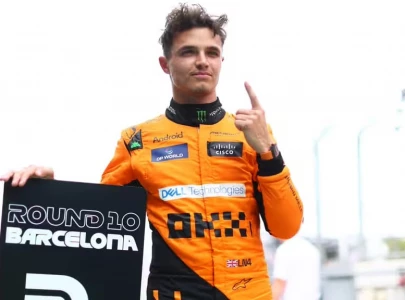 norris shrugs off mclaren fire to nab spanish pole after best ever lap