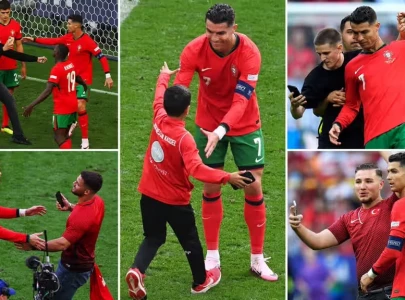 portugal coach bemoans risk to player safety as pitch invaders chase ronaldo selfies
