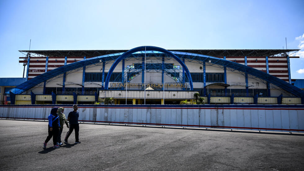 anniversary the red and blue stands of kanjuruhan stadium serve as a reminder of how little has changed since football fans were trampled or suffocated to death in the october 1 stampede photo afp