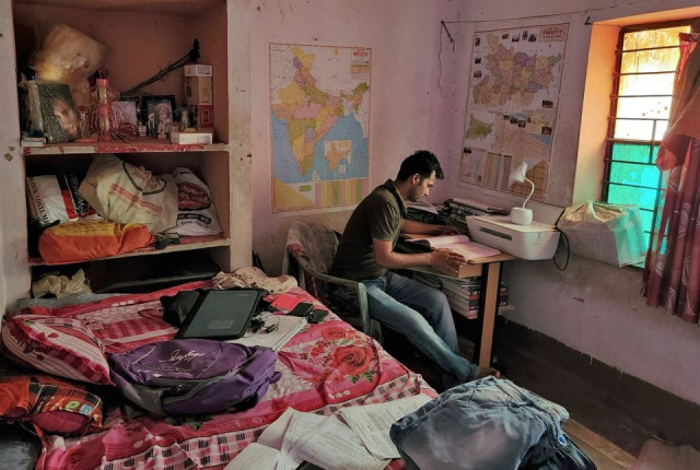 prem prakash a government job aspirant prepares for an examination for a railway job in his rented room in arrah in the eastern state of bihar india june 24 2022 reuters prem prakash a government job aspirant prepares for an examination for a railway job in his rented room in arrah in the eastern state of bihar india june 24 2022 reuters