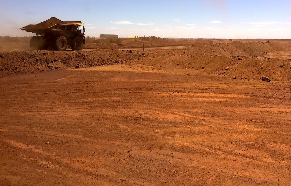 an autonomous vehicle drives along a road as it collects iron ore at australia s fortescue metals group mine in the pilbara region located south east of the coastal town of port hedland in western australia november 29 2018 photo reuters