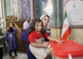 iran votes in election runoff