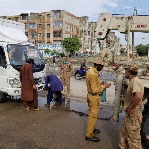 army mobile recovery vehicles are deployed at various choke points to shift vehicles struck in flood to keep flow of traffic photo ispr army mobile recovery vehicles are deployed at various choke points to shift vehicles struck in flood to keep flow of traffic photo ispr