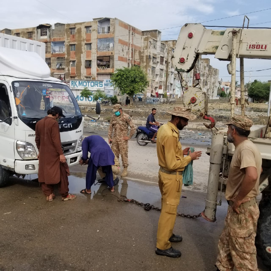 army mobile recovery vehicles are deployed at various choke points to shift vehicles struck in flood to keep flow of traffic photo ispr