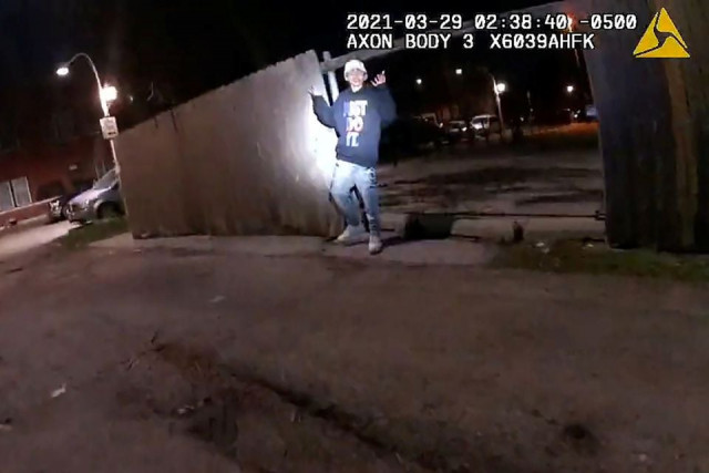 adam toledo 13 holds up his hands a split second before he was shot by police in little village a neighbourhood on the west side of chicago illinois us march 29 2021 in a still image from police body camera video image taken march 29 2021 photo reuters adam toledo 13 holds up his hands a split second before he was shot by police in little village a neighbourhood on the west side of chicago illinois us march 29 2021 in a still image from police body camera video image taken march 29 2021 photo reuters