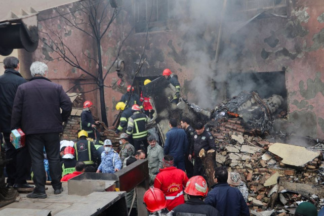 first responder units work after a fighter jet crashed in tabriz iran february 21 2022 mehr news wana west asia news agency via reuters first responder units work after a fighter jet crashed in tabriz iran february 21 2022 mehr news wana west asia news agency via reuters