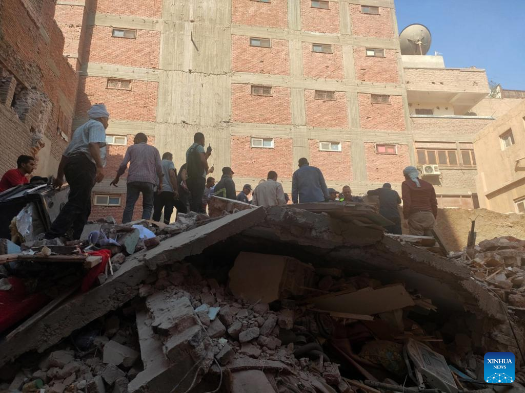 people search for survivors from a collapsed building in assiut egypt photo xinhua