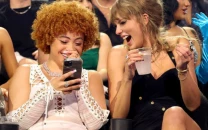 taylor swift arrives at super bowl with ice spice and este haim to support travis kelce taylor swift arrives at super bowl with ice spice and este haim to support travis kelce