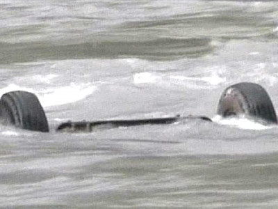 18 die as school van plunges into river