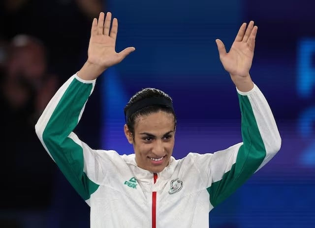 gold medallist imane khelif of algeria celebrates during victory ceremony of paris olympics after taking women s 66kg boxing title at roland garros stadium paris france on august 09 2024 photo reuters gold medallist imane khelif of algeria celebrates during victory ceremony of paris olympics after taking women s 66kg boxing title at roland garros stadium paris france on august 09 2024 photo reuters