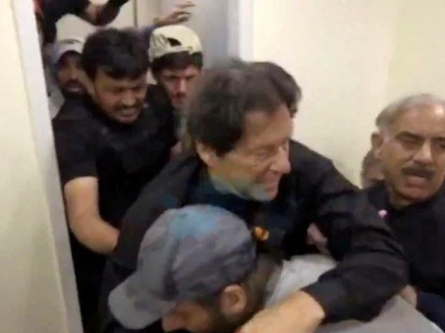 former prime minister imran khan is helped after he was shot in the shin in wazirabad pakistan november 3 2022 screengrab