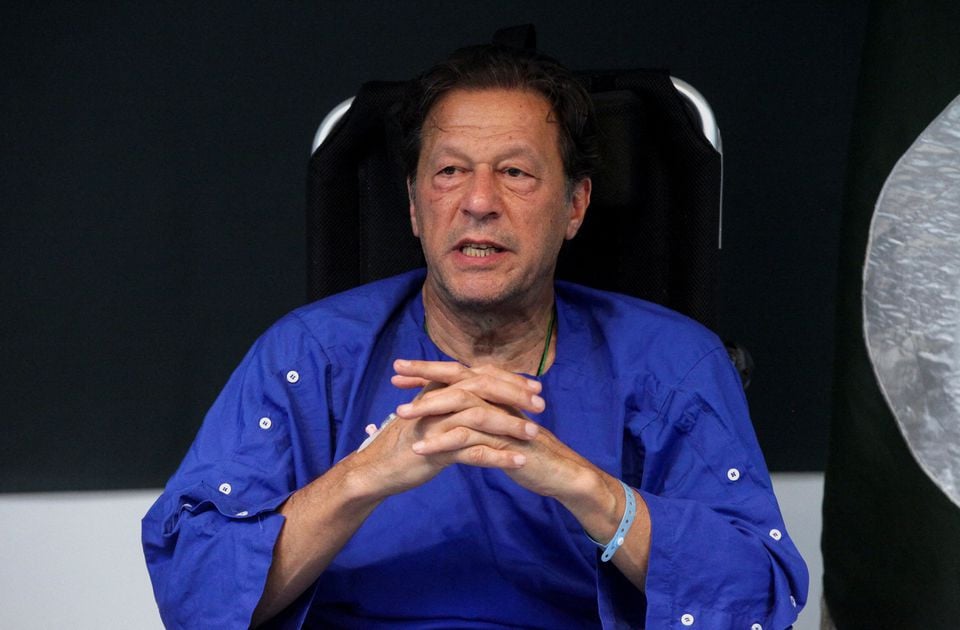 former prime minister imran khan addresses a news conference after he was wounded following a shooting incident during a long march in wazirabad at the shaukat khanum memorial cancer hospital research centre in lahore pakistan november 4 2022 photo reuters