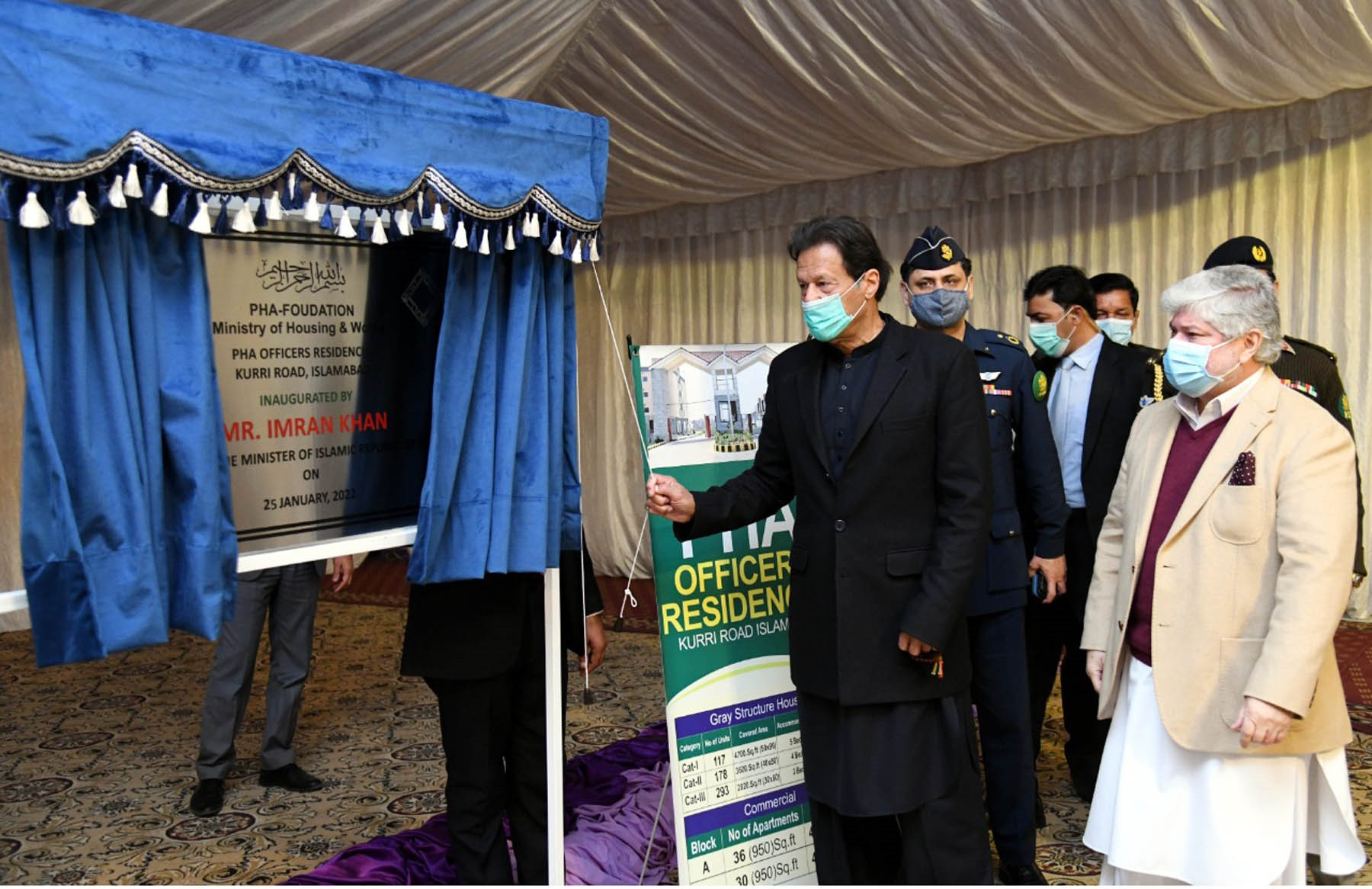 prime minister imran khan unveiling a plaque to inaugurate pha officers residentia kurri road and pha apartments in islamabad on january 25 2022 photo pid