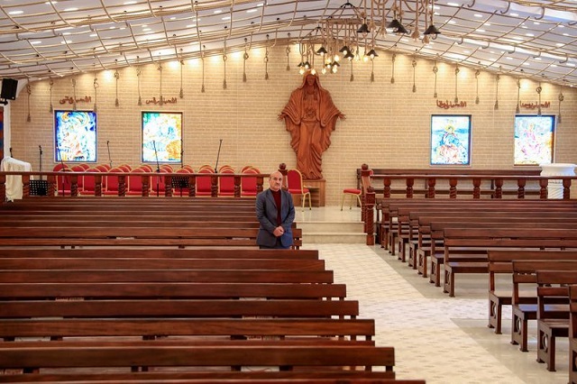 Thanoun Yahya, a 59 year-old an Iraqi Christian from the city of Mosul, stands at Al-Bishara church in Mosul, Iraq February 22, 2021. Picture taken February 22, 2021. PHOTO: REUTERS