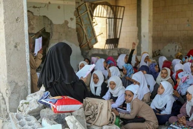The conditions are basic in this war damaged school in Yemen's Taez city, but teachers are still holding classes despite the dire conditions. PHOTO: AFP