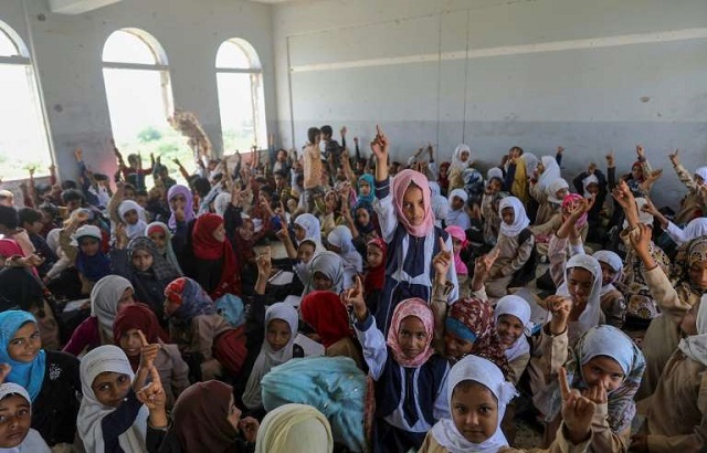 Classrooms are crowded as pupils start the new school year in Yemen, especially since over 2,500 schools have closed in the country's civil war, with those open taking on as many extra students as they can. PHOTO: AFP