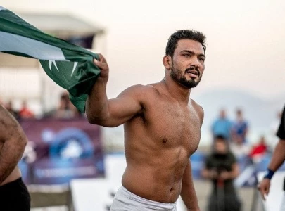 inam butt wins gold medal at world beach wrestling