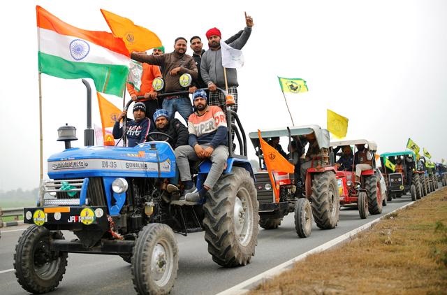 farmers participate in a tractor rally to protest against the newly passed farm bills on a highway on the outskirts of new delhi india january 7 2021 photo reuters