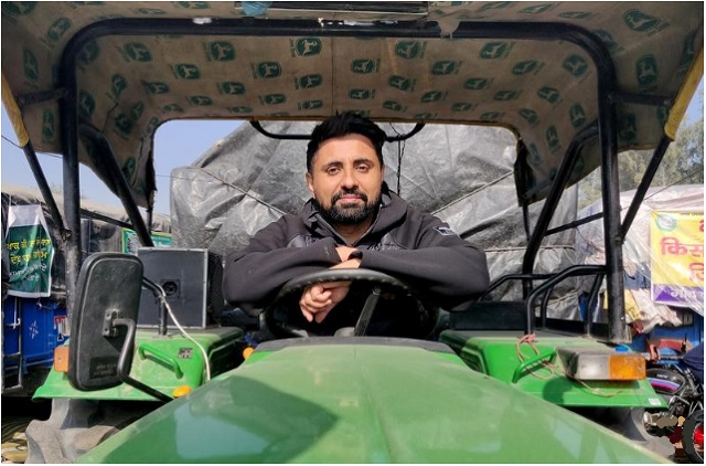 bhavjit singh 38 a computer professional poses on a tractor at the site of a protest against new farm laws at singhu border near delhi india december 14 2020 photo reuters