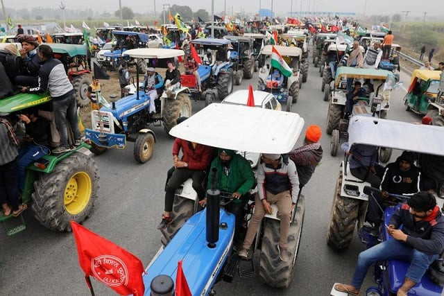 farmers participate in a tractor rally to protest against the newly passed farm bills on a highway on the outskirts of new delhi india january 7 2021 photo reuters farmers participate in a tractor rally to protest against the newly passed farm bills on a highway on the outskirts of new delhi india january 7 2021 photo reuters