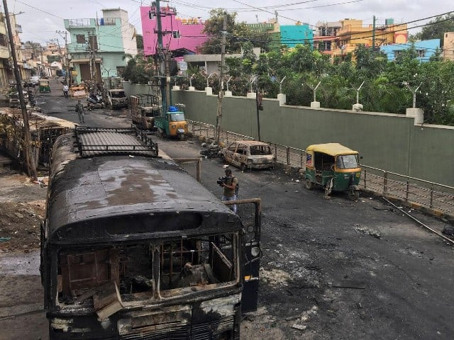the violence began late on tuesday with mobs pelting stones burning vehicles and setting a police station on fire photo reuters the violence began late on tuesday with mobs pelting stones burning vehicles and setting a police station on fire photo reuters