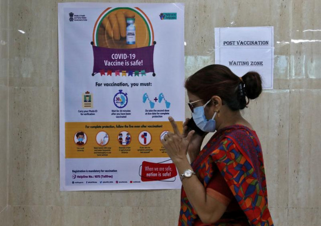 a woman speaks inside a waiting zone area at a health clinic where covid 19 vaccination is being given to healthcare workers in kolkata india february 1 2021 photo reuters file a woman speaks inside a waiting zone area at a health clinic where covid 19 vaccination is being given to healthcare workers in kolkata india february 1 2021 photo reuters file