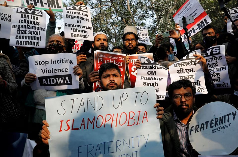 demonstrators hold placards during a protest against hate speech against muslims by hindu leaders in new delhi india december 27 2021 photo reuters