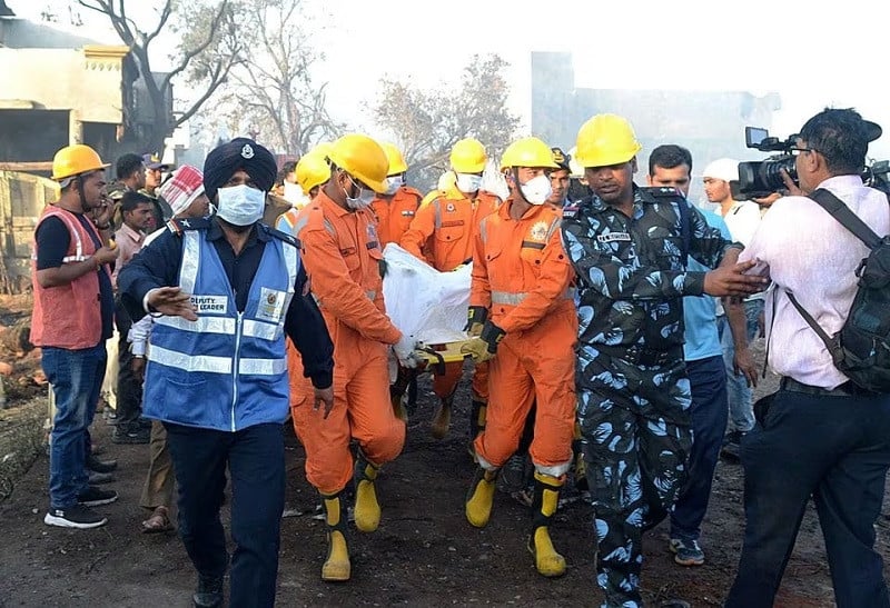 rescue members carry a victim following a blast in a firecracker factory in harda madhya pradesh india february 6 2024 photo reuters