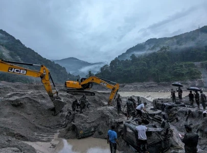 himalayan lake flooding in india kills 18 nearly 100 missing
