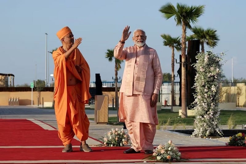 India's Prime Minister Narendra Modi gestures, as he attends the inauguration of the BAPS Hindu temple in Abu Dhabi, United Arab Emirates, February 14, 2024. PHOTO: REUTERS