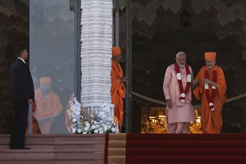 India's Prime Minister Narendra Modi reacts, as he attends the inauguration of the BAPS Hindu temple in Abu Dhabi, United Arab Emirates, February 14, 2024. PHOTO: AREUTERS