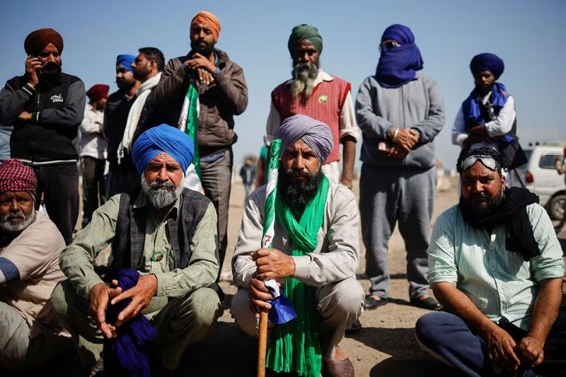 farmers listen to a speaker at a site where there are farmers who are marching towards new delhi at shambhu barrier india february 22 2024 photo reuters