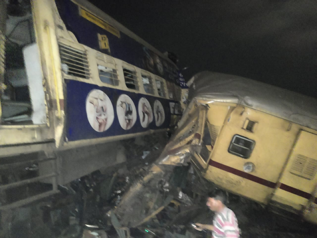 train squashes car killing driver