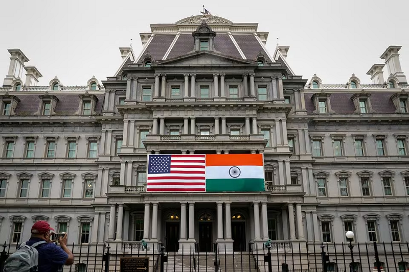 the flags of the united states and india are displayed on the eisenhower executive office building at the white house in washington us june 21 2023 photo reuters