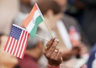 an attendee holds u s and india s flags as they gather on the south lawn of the white house to watch an official state arrival ceremony as us president joe biden hosts india s prime minister narendra modi for a state visit at the white house in washington us june 22 2023 photo reuters