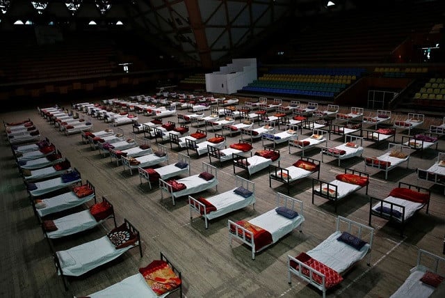 Beds are seen in an indoor stadium converted into a Covid-19 care facility amidst the spread of the coronavirus disease (Covid-19) in Srinagar April 29, 2021. PHOTO: REUTERS
