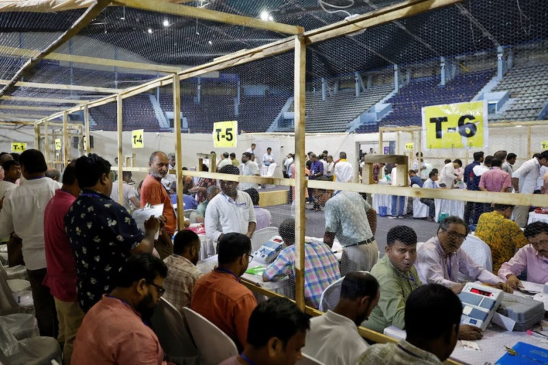 Election staff members count votes for India's general election inside a vote counting centre in Kolkata, India, June 4, 2024. PHOTO: REUTERS