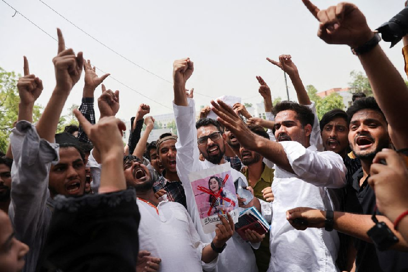 Jamia Millia Islamia university students shout slogans against the suspended Bharatiya Janata Party (BJP) spokeswoman Nupur Sharma and expelled BJP leader Naveen Jindal at Jamia Millia Islamia university in New Delhi, India, June 10, 2022. PHOTO: REUTERS