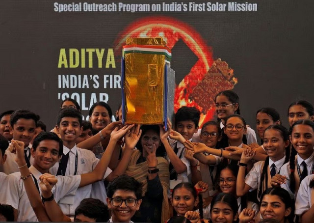 school children and their teachers hold a model of aditya l1 spacecraft at gujarat science city in ahmedabad india september 2 2023 photo reuters school children and their teachers hold a model of aditya l1 spacecraft at gujarat science city in ahmedabad india september 2 2023 photo reuters